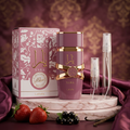 Yara Elixir with a muted plum bottle and plain travel sprays